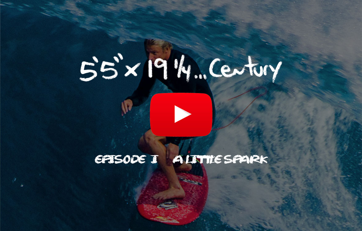 Surfer riding a wave with video play button overlay.