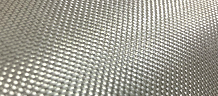 Close-up of a textured magnesium fiber surface.
