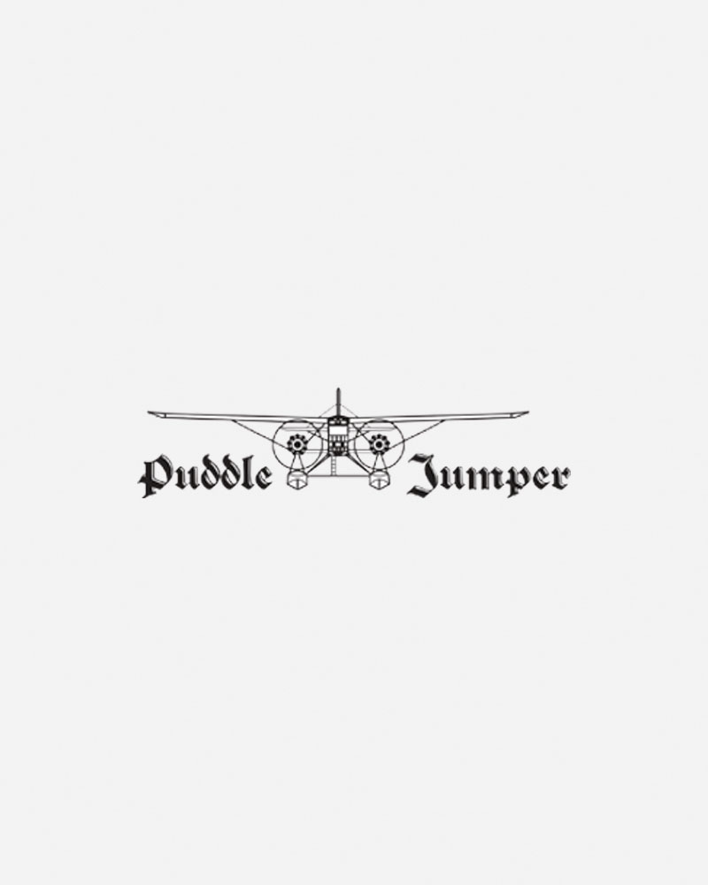 Logo featuring a vintage airplane and the text "Puddle Jumper.