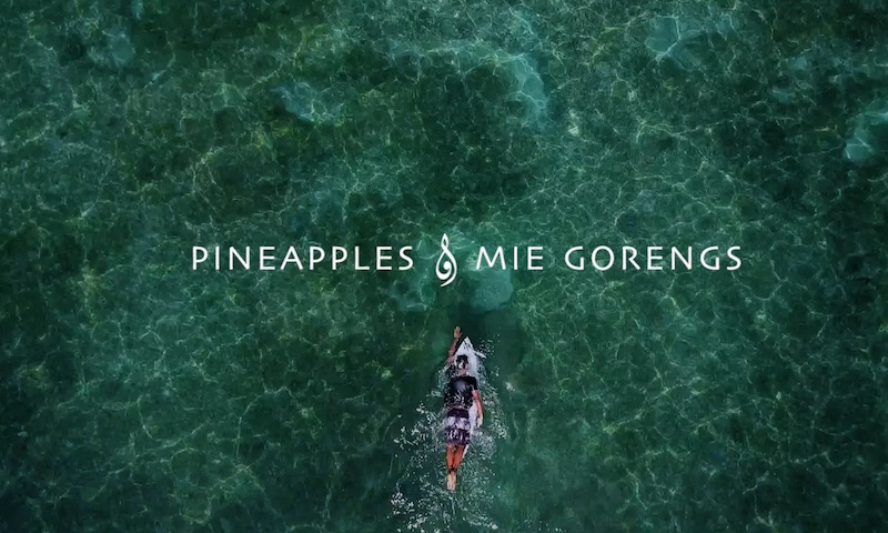 Person swimming in clear water with text overlay.