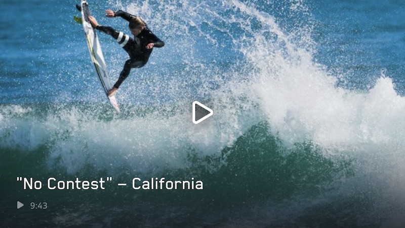 Surfer performing a trick above ocean waves in California.
