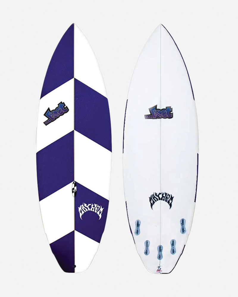 Surfboard with purple and white chevron design.